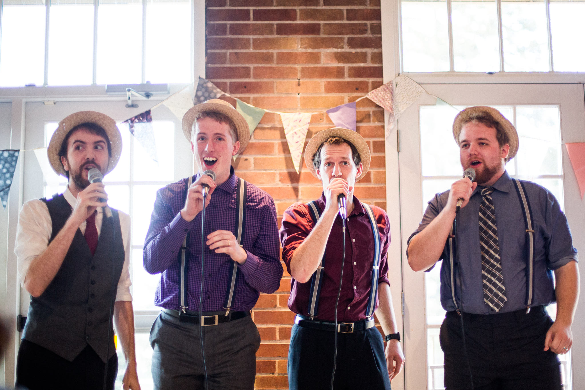 A photo of the bearded baritones performing