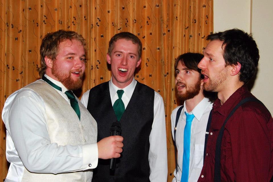 A photo of the bearded baritones performing